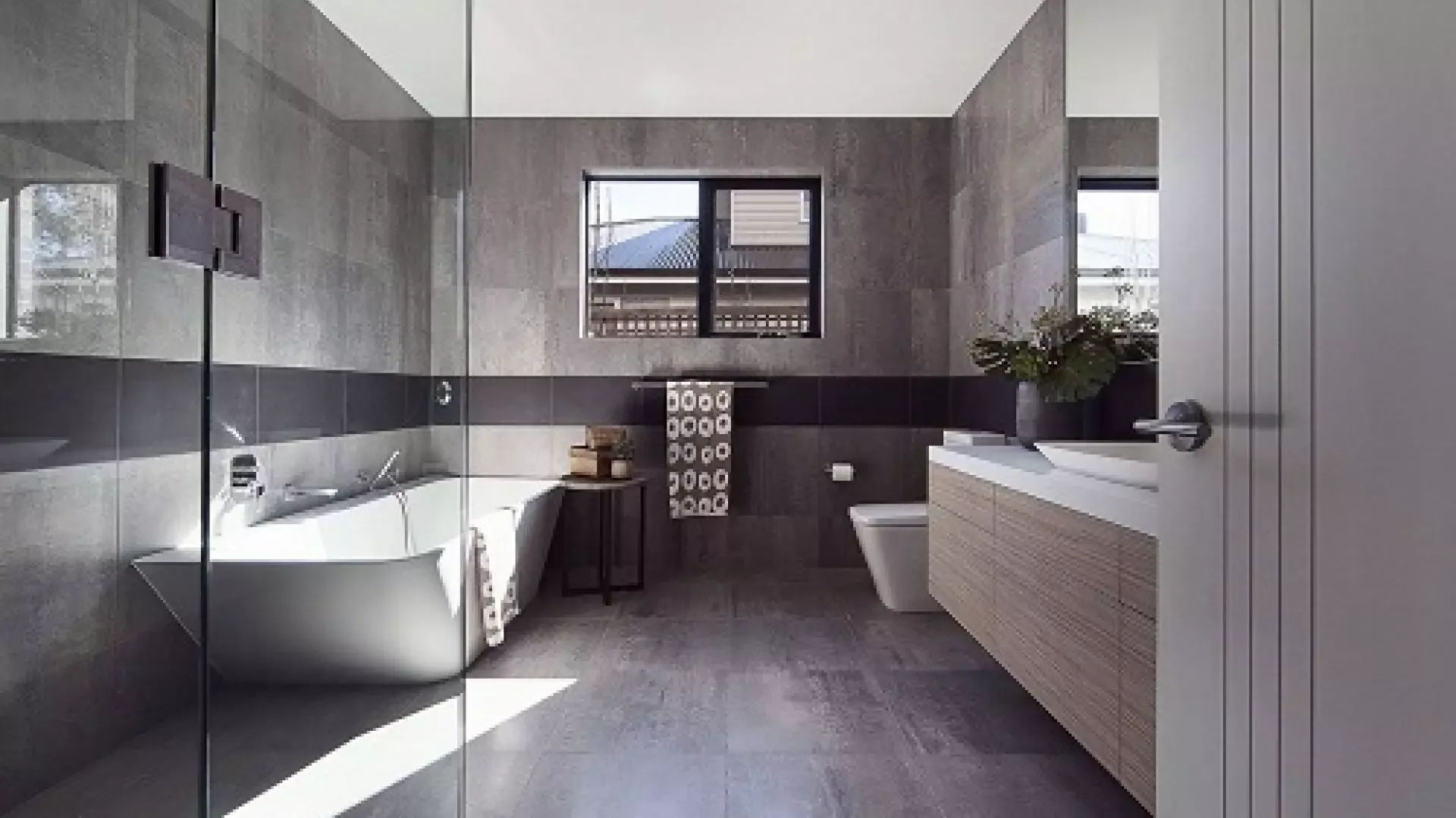 Gạch ốp nhà tắm nhỏ đơn sắc màu xám đen nổi bật